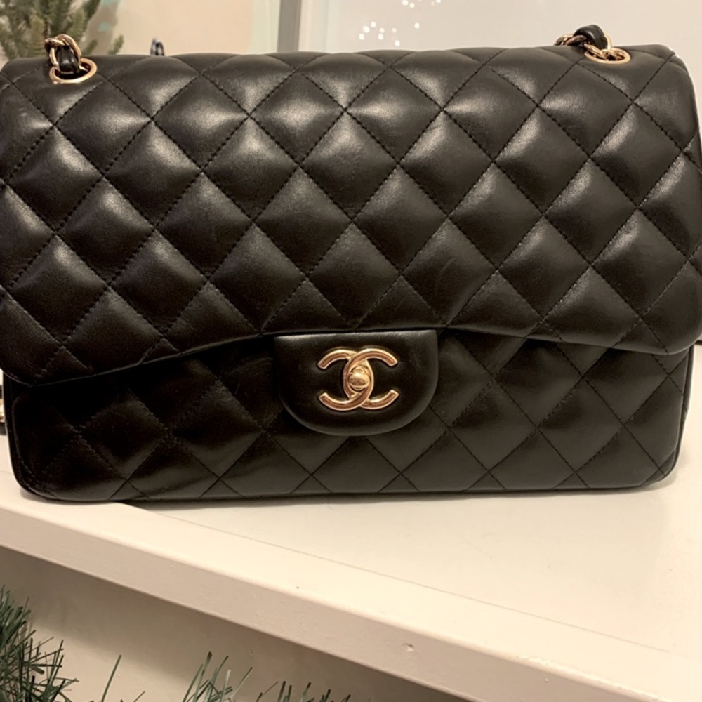 Black Chanel jumbo caviar leather double flap